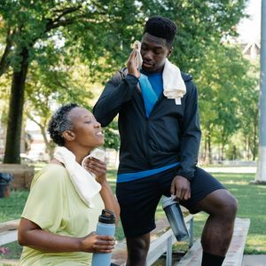 Water bottle and towel on a bench in a minimalist gym
